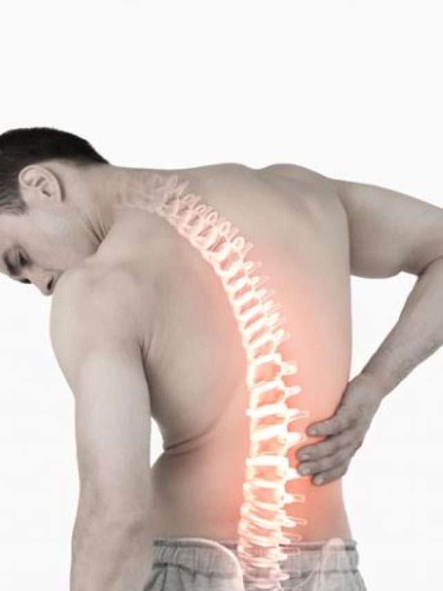 a-man-with-visible-spine-holds-his-back