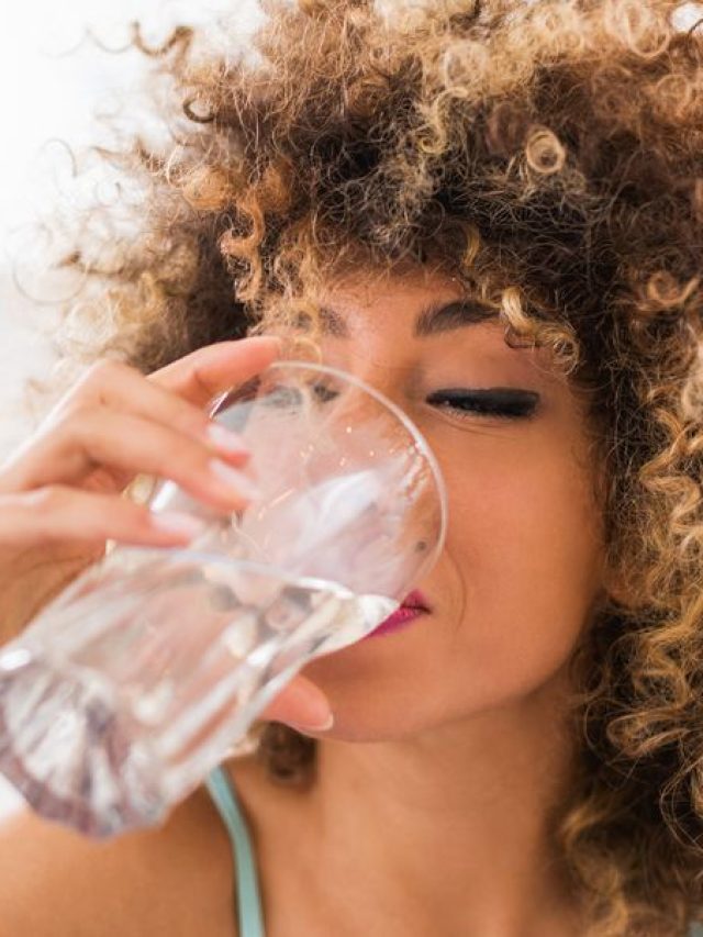 thirsty-african-american-woman-drinking-water-royalty-free-image-472717546-1547055203