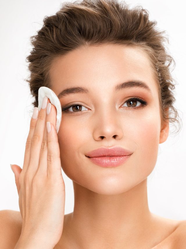 Woman,Removing,Makeup,,Holds,Cotton,Pads,Near,Face.,Photo,Of